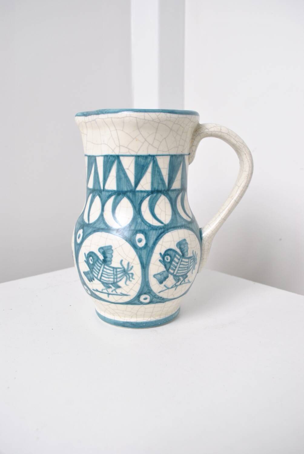 Cracked white earthenware pitcher 1960