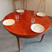 Table de salle à manger en bois exotique