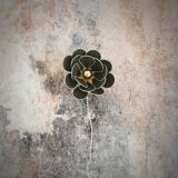 Flower wall light made of rattan and fir green linen