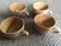 Series of 4 sandstone cups