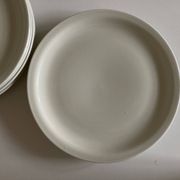 Set of 7 Scandinavian modernist flat plates in ivory earthenware