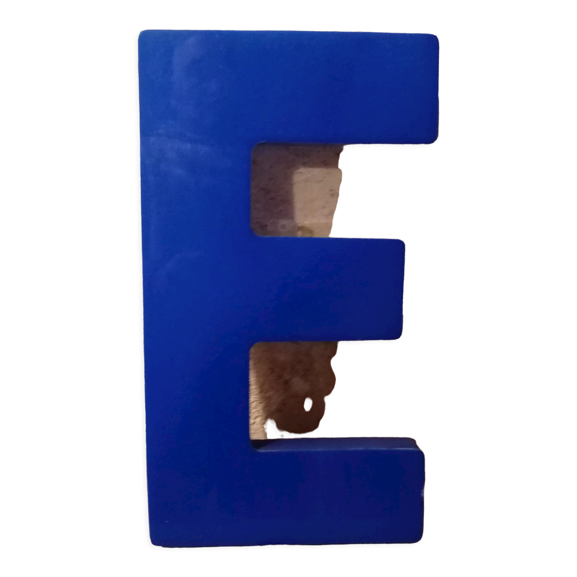 Letter E vintage sign in blue plexiglass