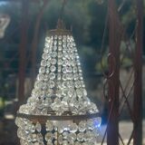 Basket chandelier with crystal and gilded brass pendants, circa 1930.
