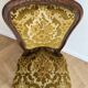 Antique Baroque-style armchair in wood and golden velvet
