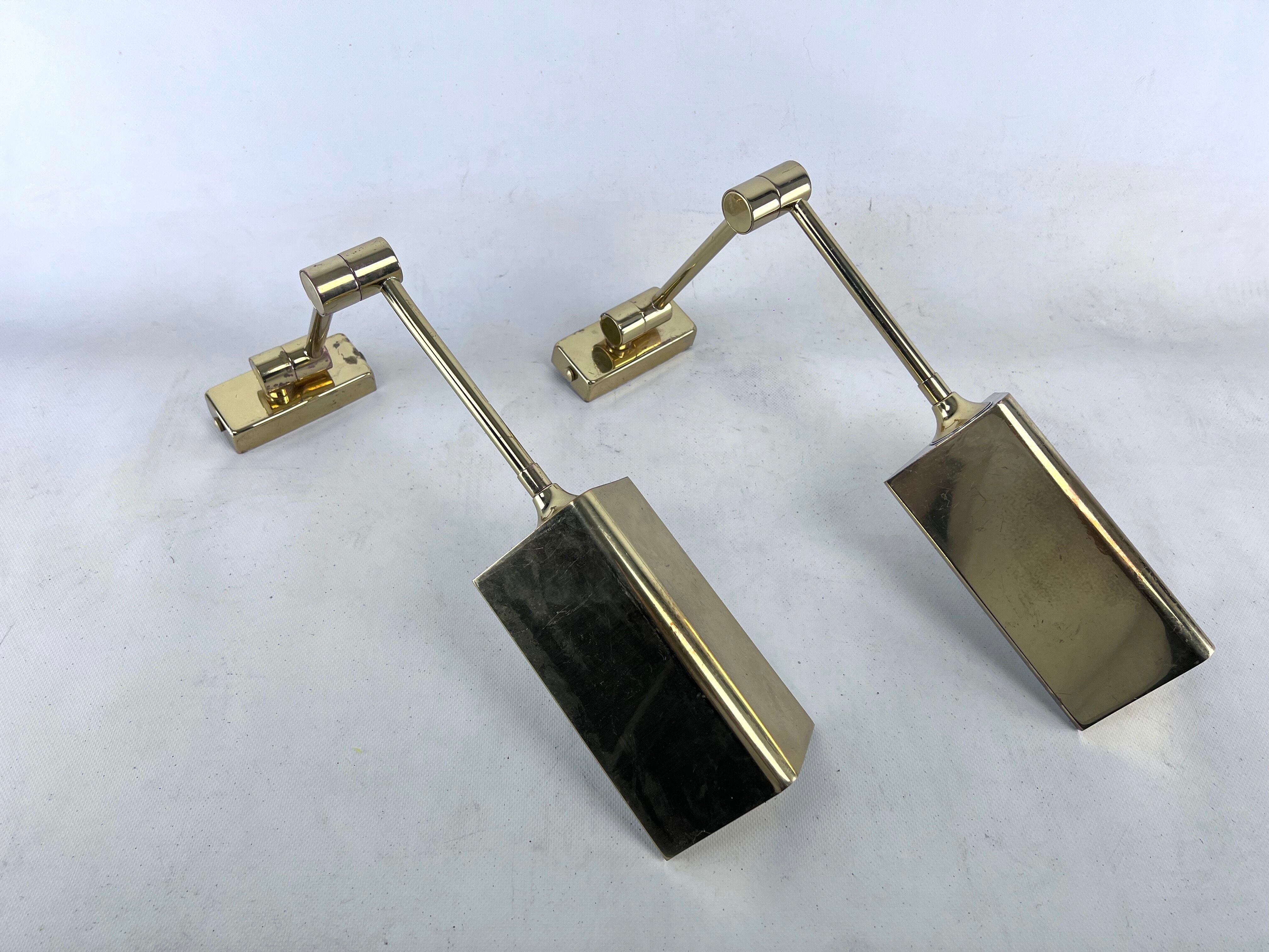 Postmodern pair of articulated brass wall lamps by Baulmann Leuchten. Germany 1980s