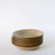 Set of 7 small deep brunch plates in glazed stoneware, 1970 - 19 cm