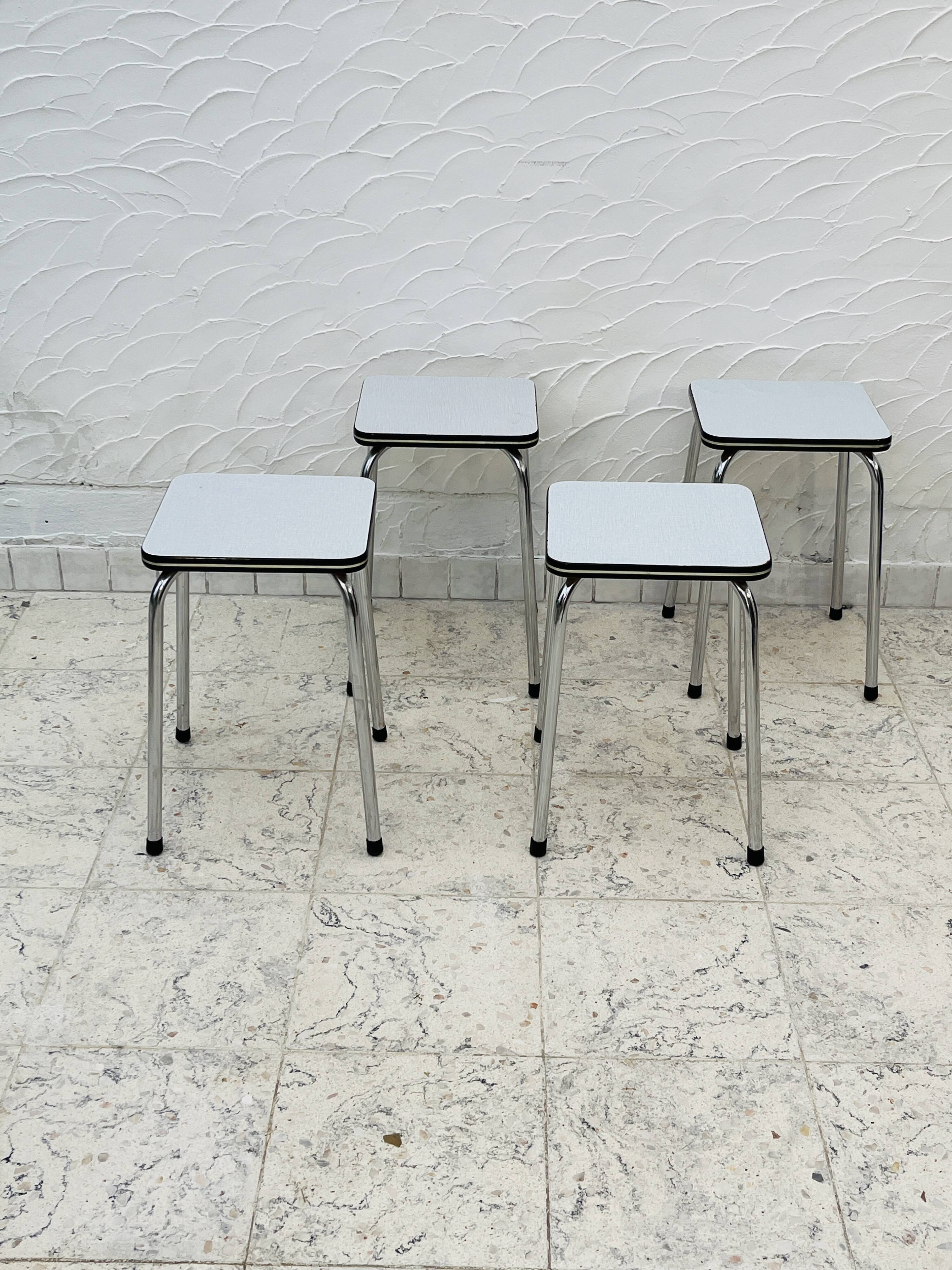 Set of 4 vintage grey chrome Formica stools.