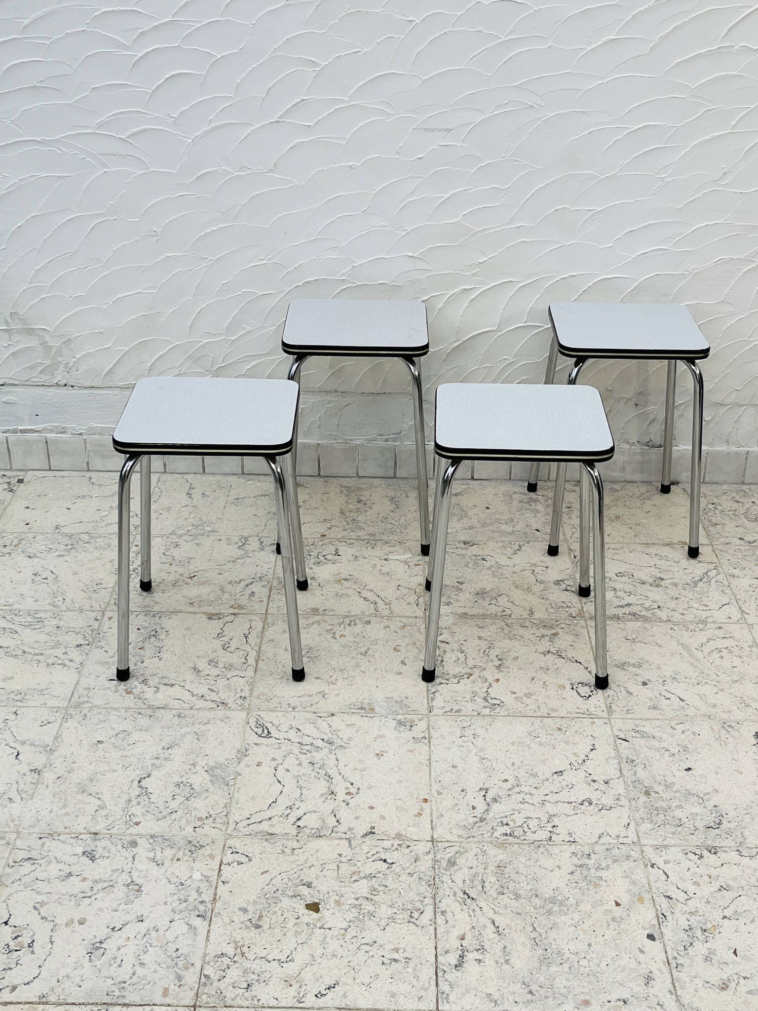 Set of 4 vintage grey chrome Formica stools.