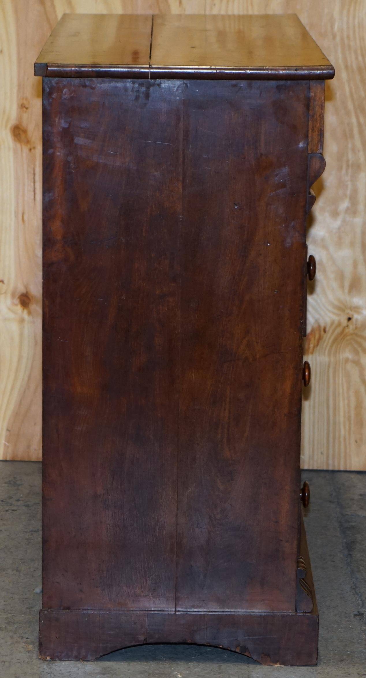Victorian flamed hardwood commode from the 19th century with a hidden drawer.