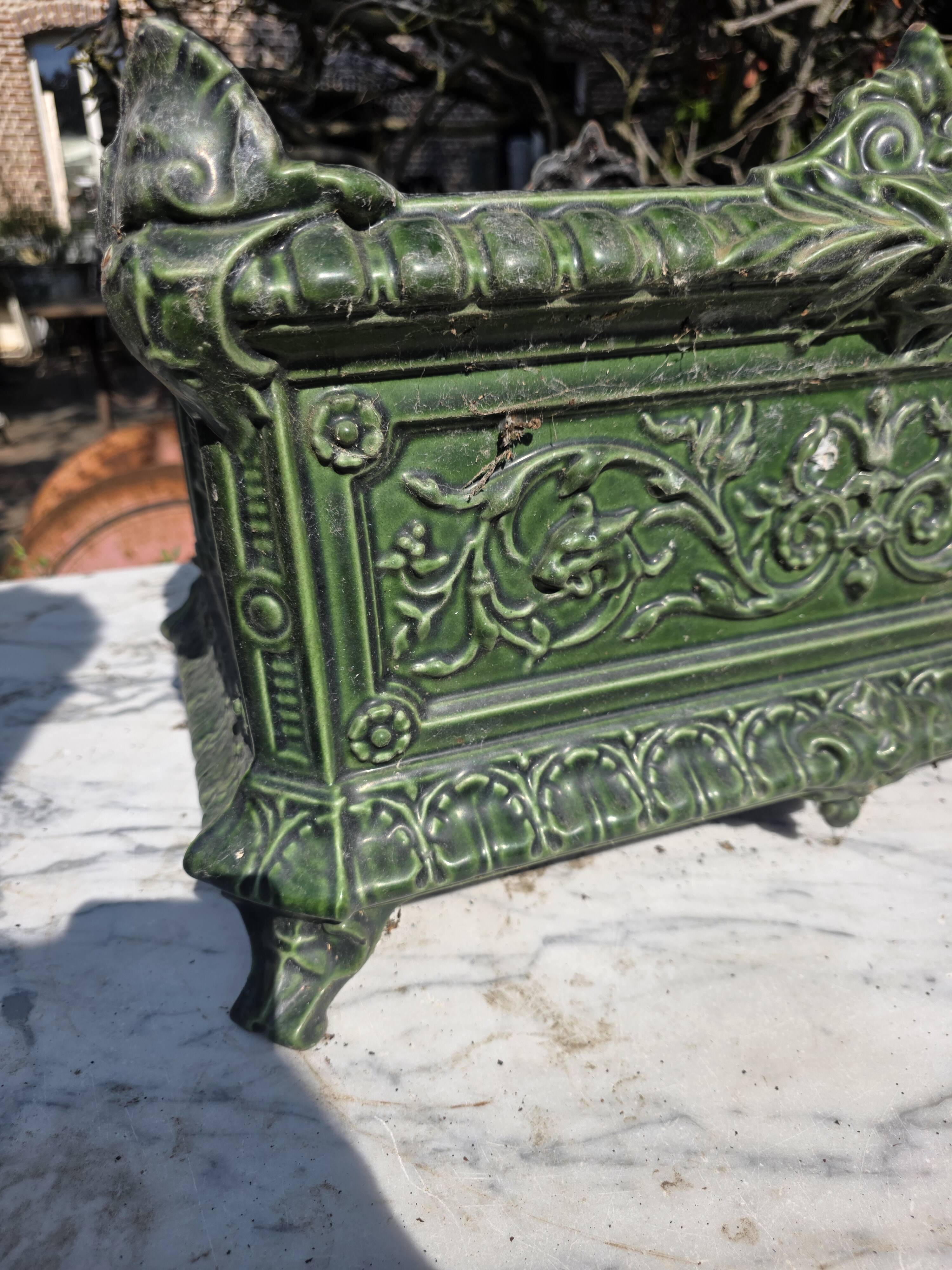 Antique enamelled cast iron planter in the Napoleon III style.