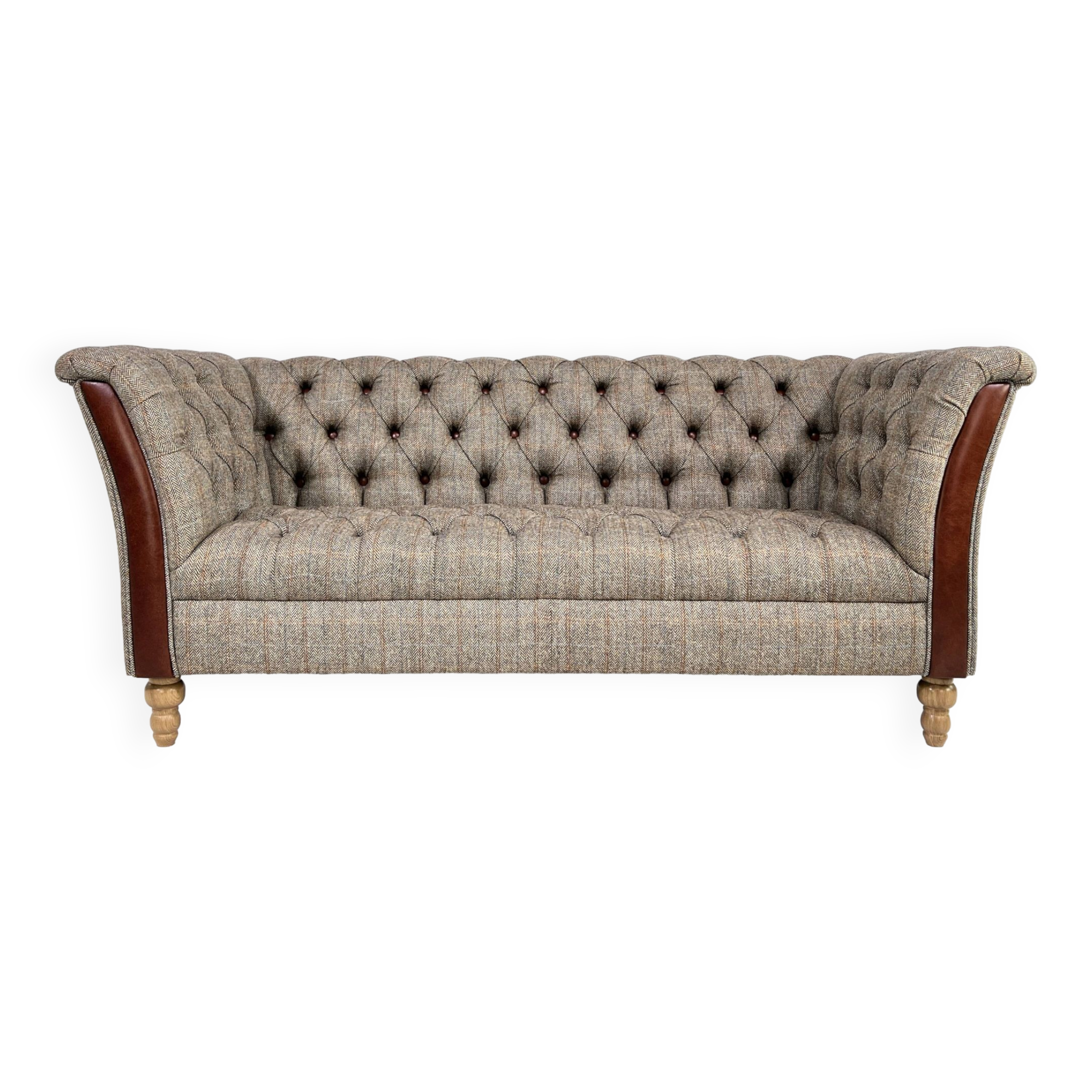 Chesterfield sofa in leather, fabric and wood