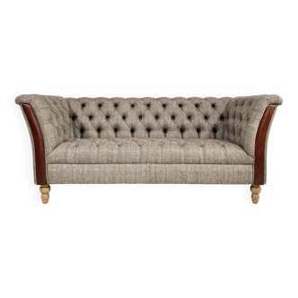 Chesterfield sofa in leather, fabric and wood