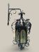 Black wrought iron lantern with stained glass. Medieval, Gothic decoration.