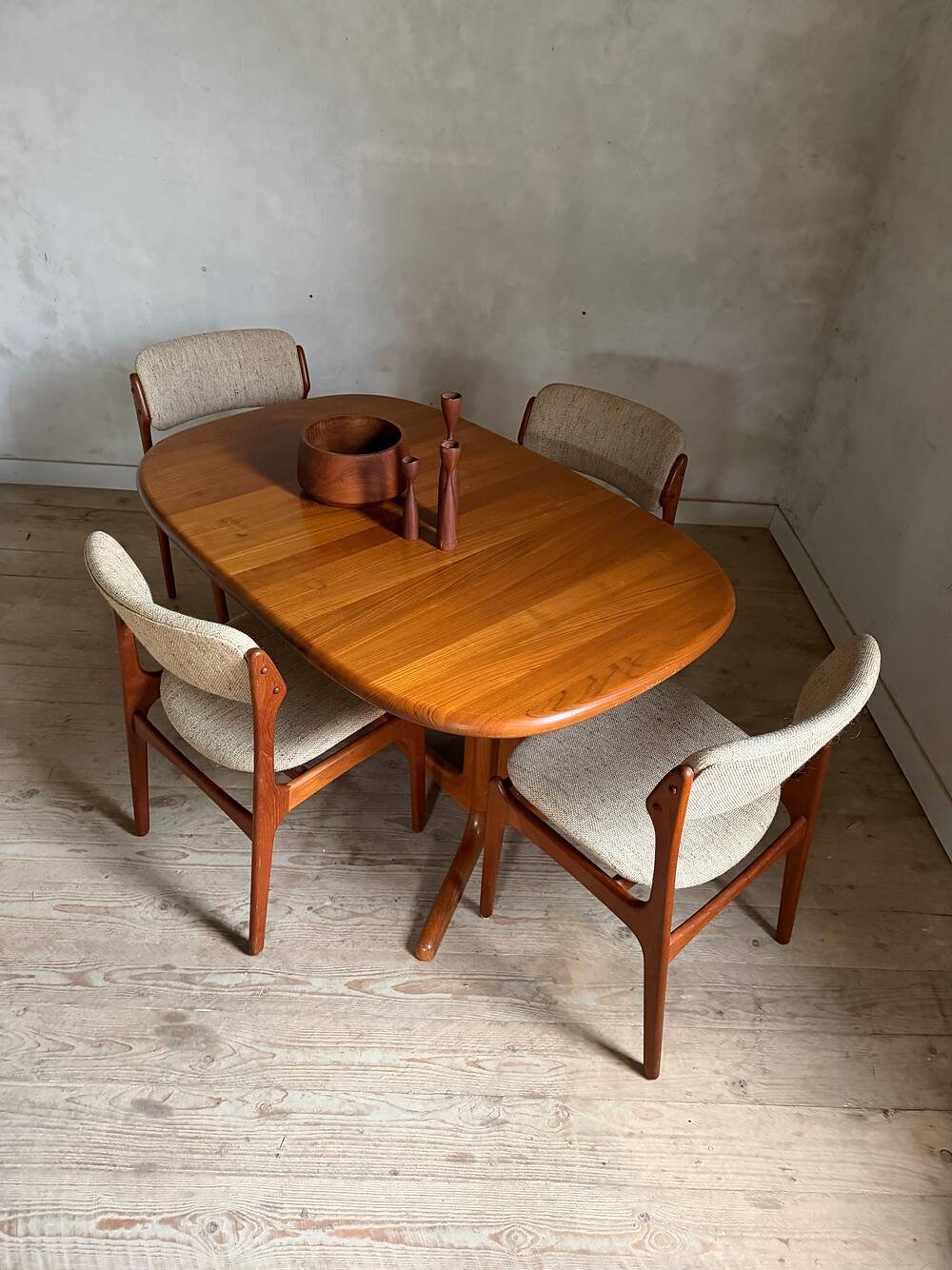 Vintage oval teak Scandinavian table with a central star base from Glostrup.