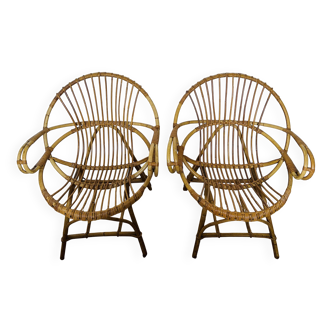 Paire de fauteuils coquille en rotin, années 70