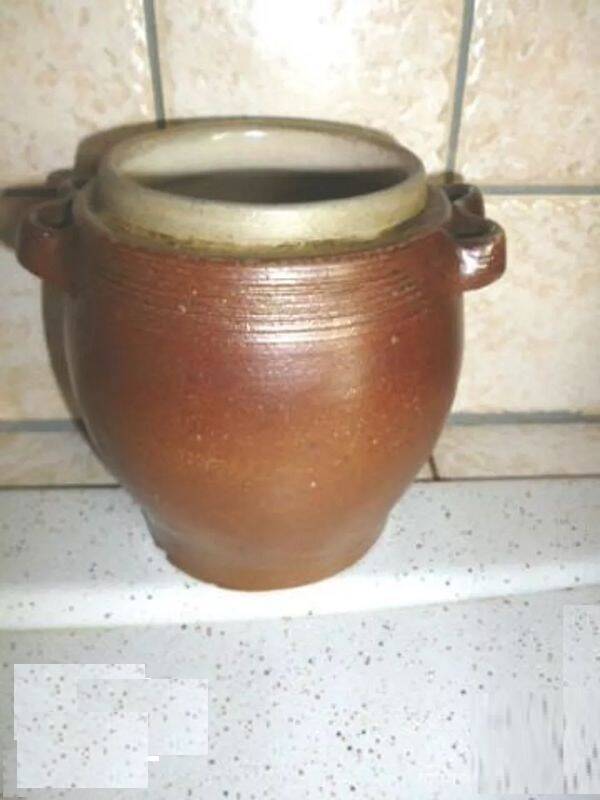 Old small terracotta pot