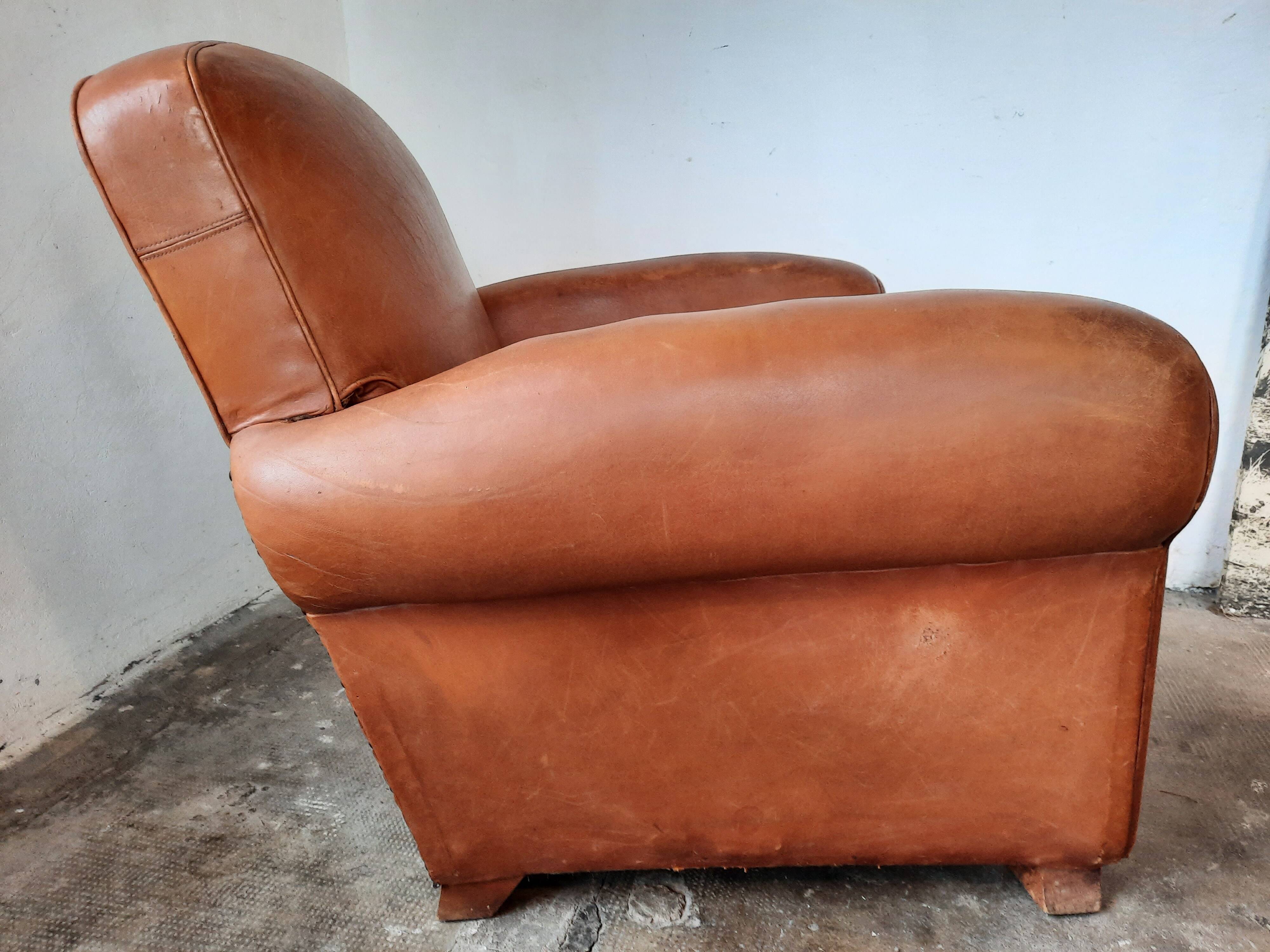Old leather club chair 1940-1950