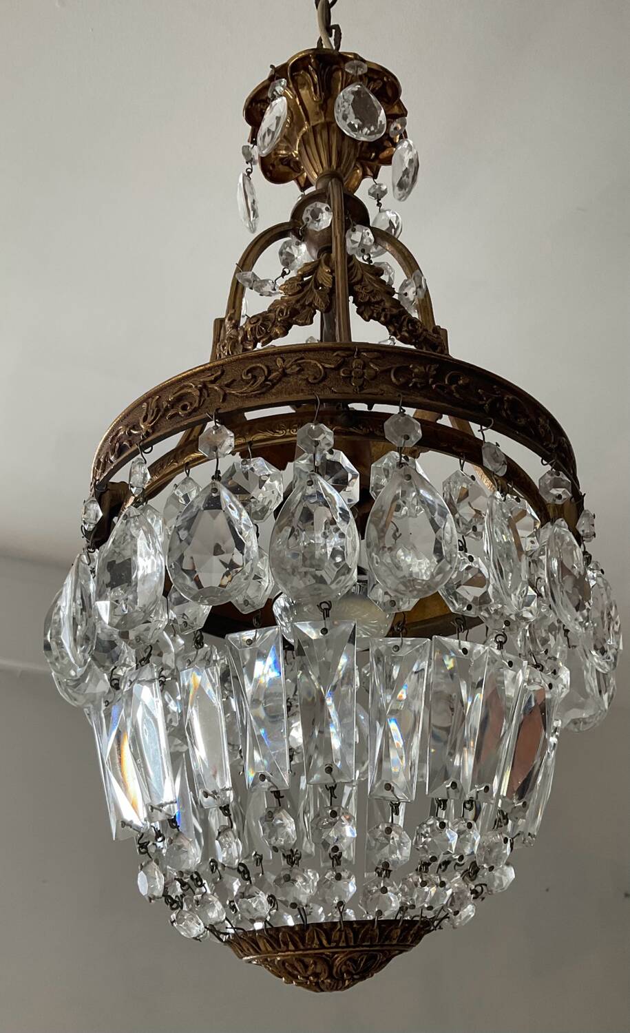 Old bronze basket chandelier with tassels