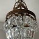 Old bronze basket chandelier with tassels