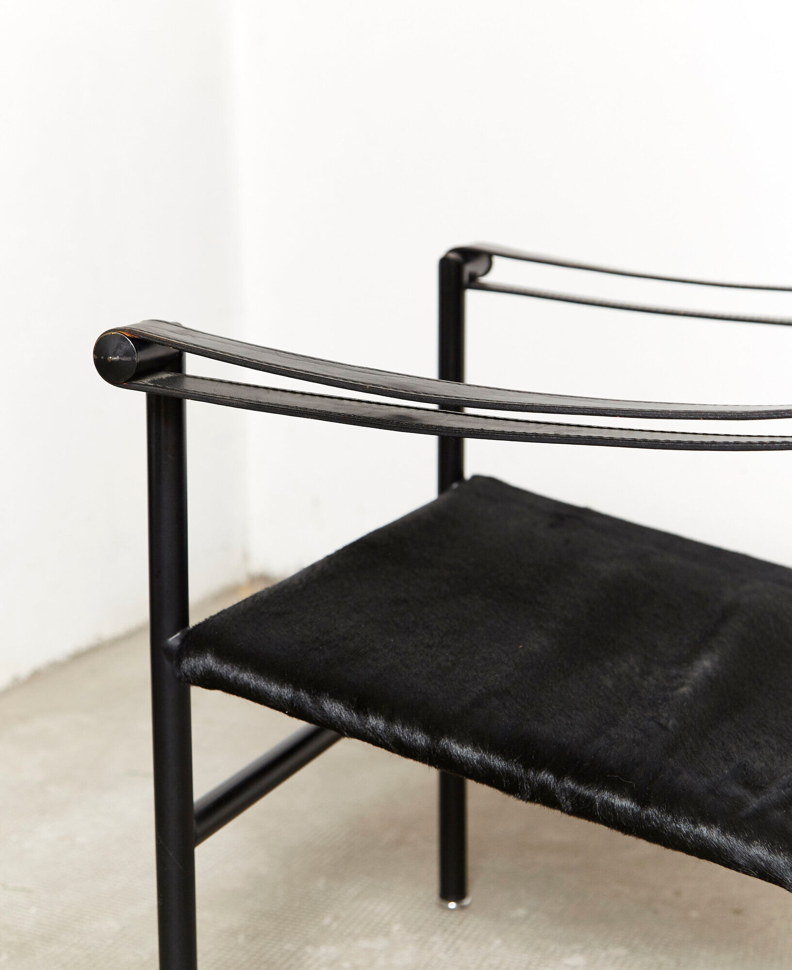 LC1 armchair by Le Corbusier, Perriand, & Jeanneret for Cassina