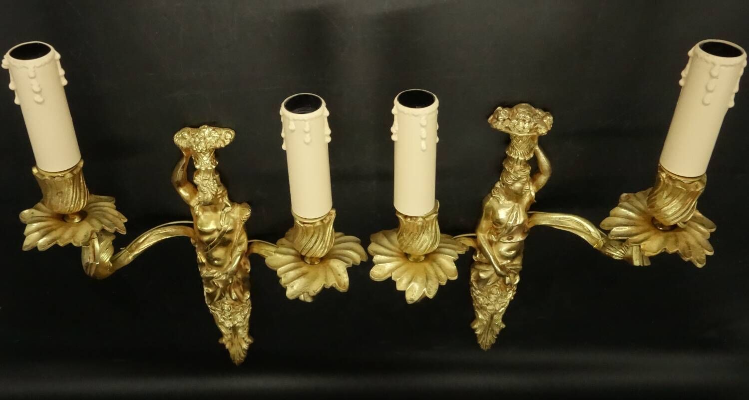 Pair of large caryatid wall sconces in Louis XV style from the 19th century - gilded bronze.