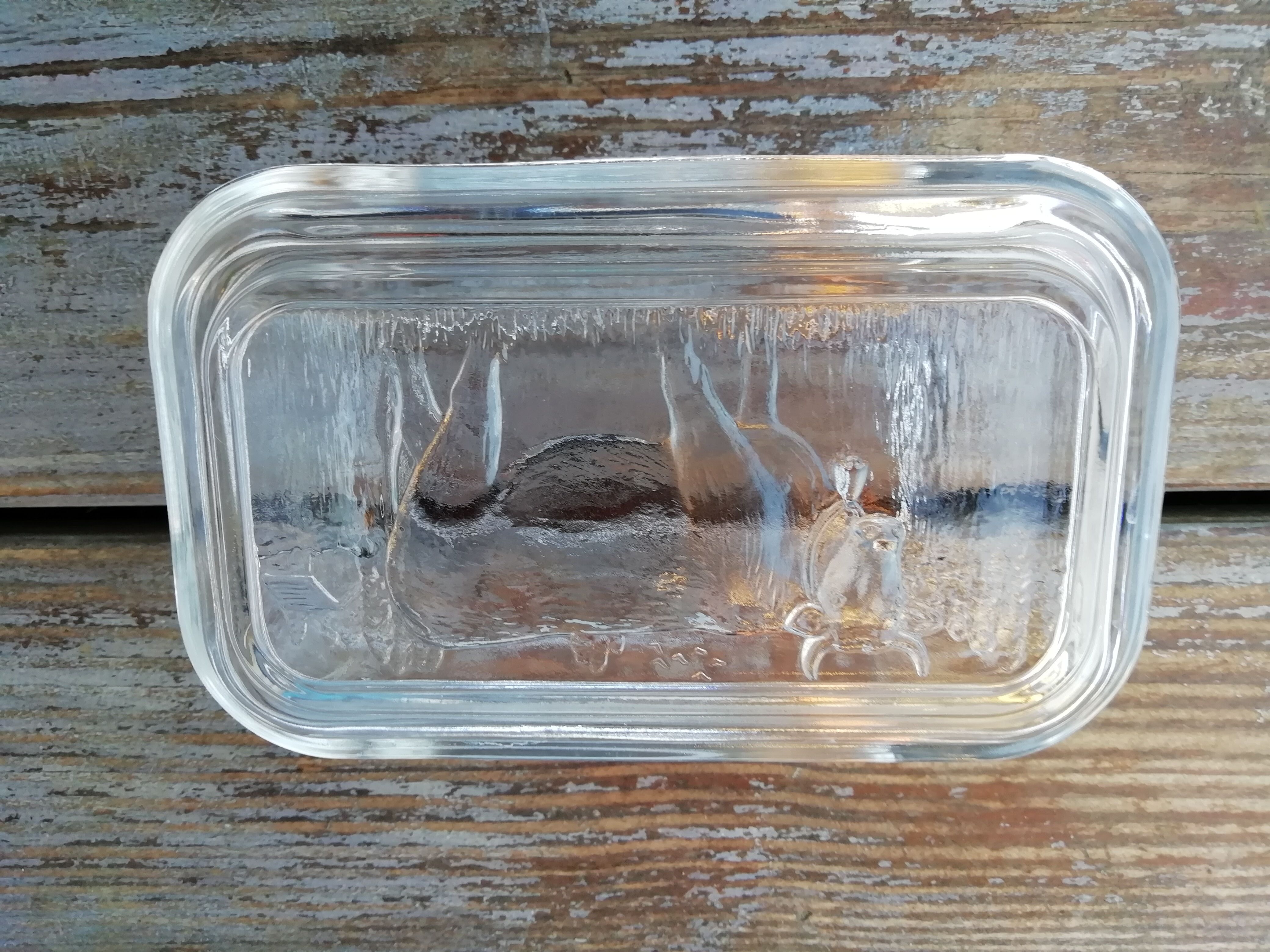 Butter glass cow motif