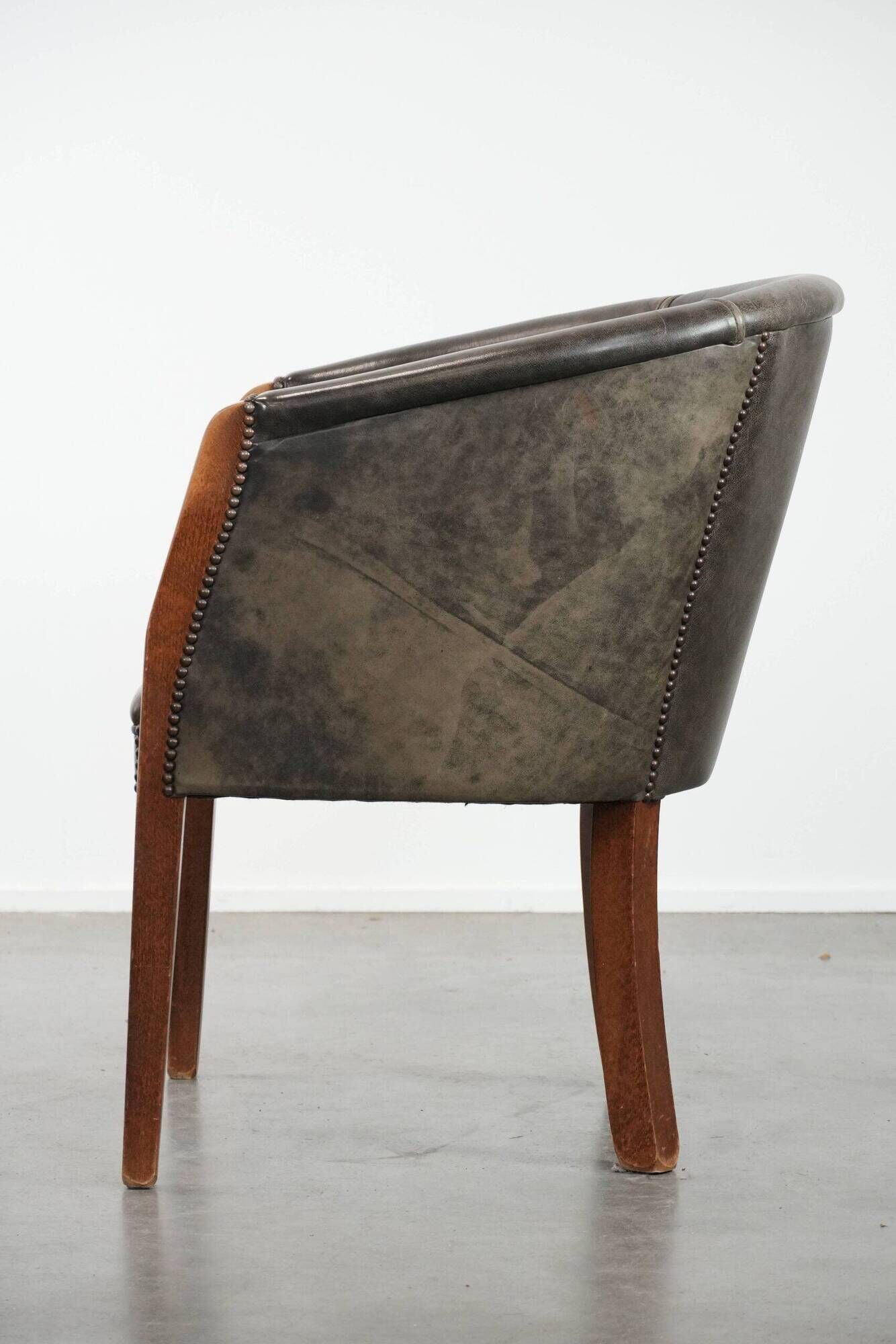 Amazing cow leather and wooden tub chair / side chair