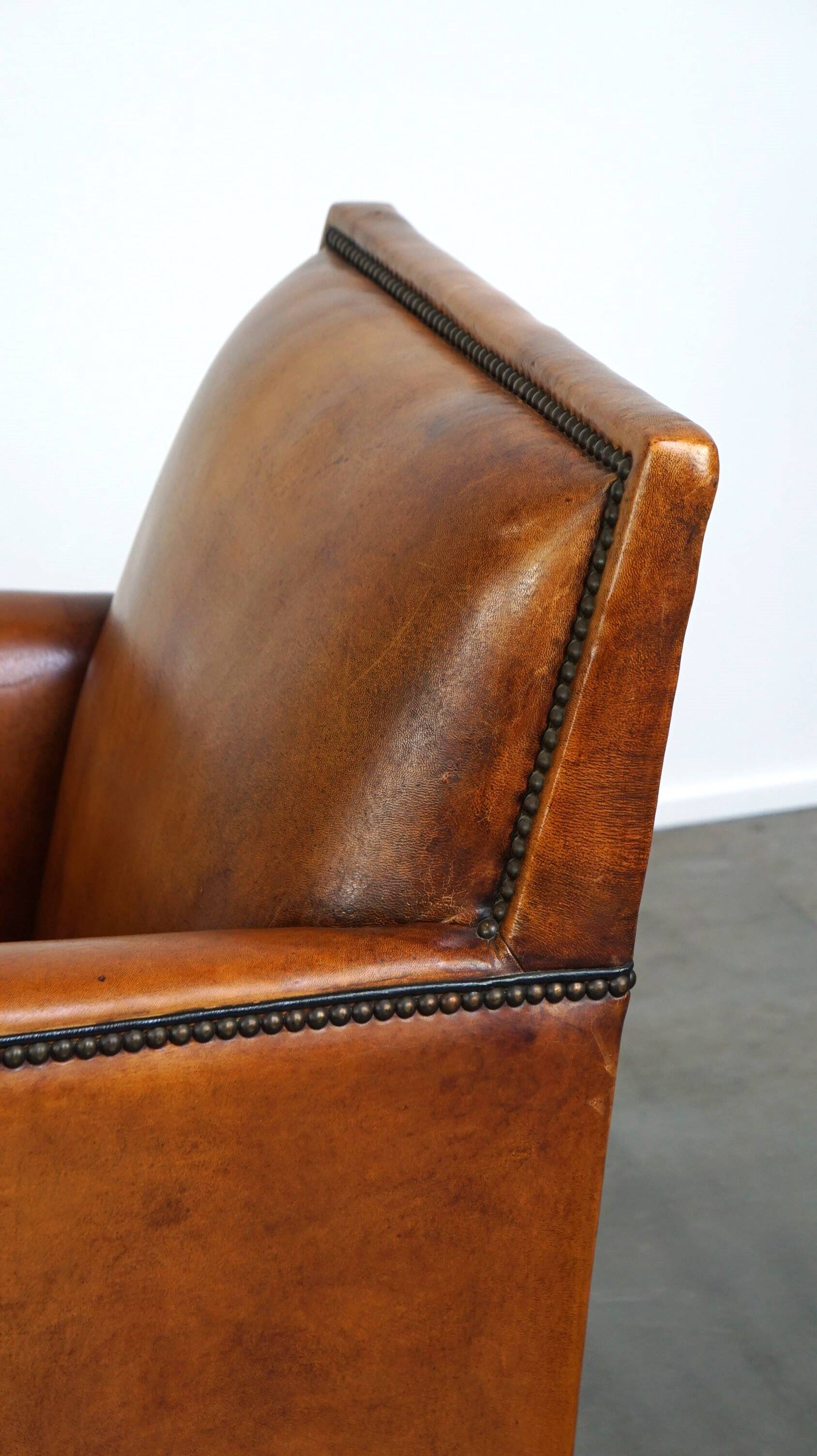 Sleek sheepskin Art Deco design armchair with beautiful details