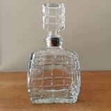Glass carafe in the shape of a perfume bottle