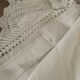 Antique white cotton pillowcase with crochet and monogram.