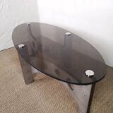 Vintage design coffee table in brushed aluminum and glass top.