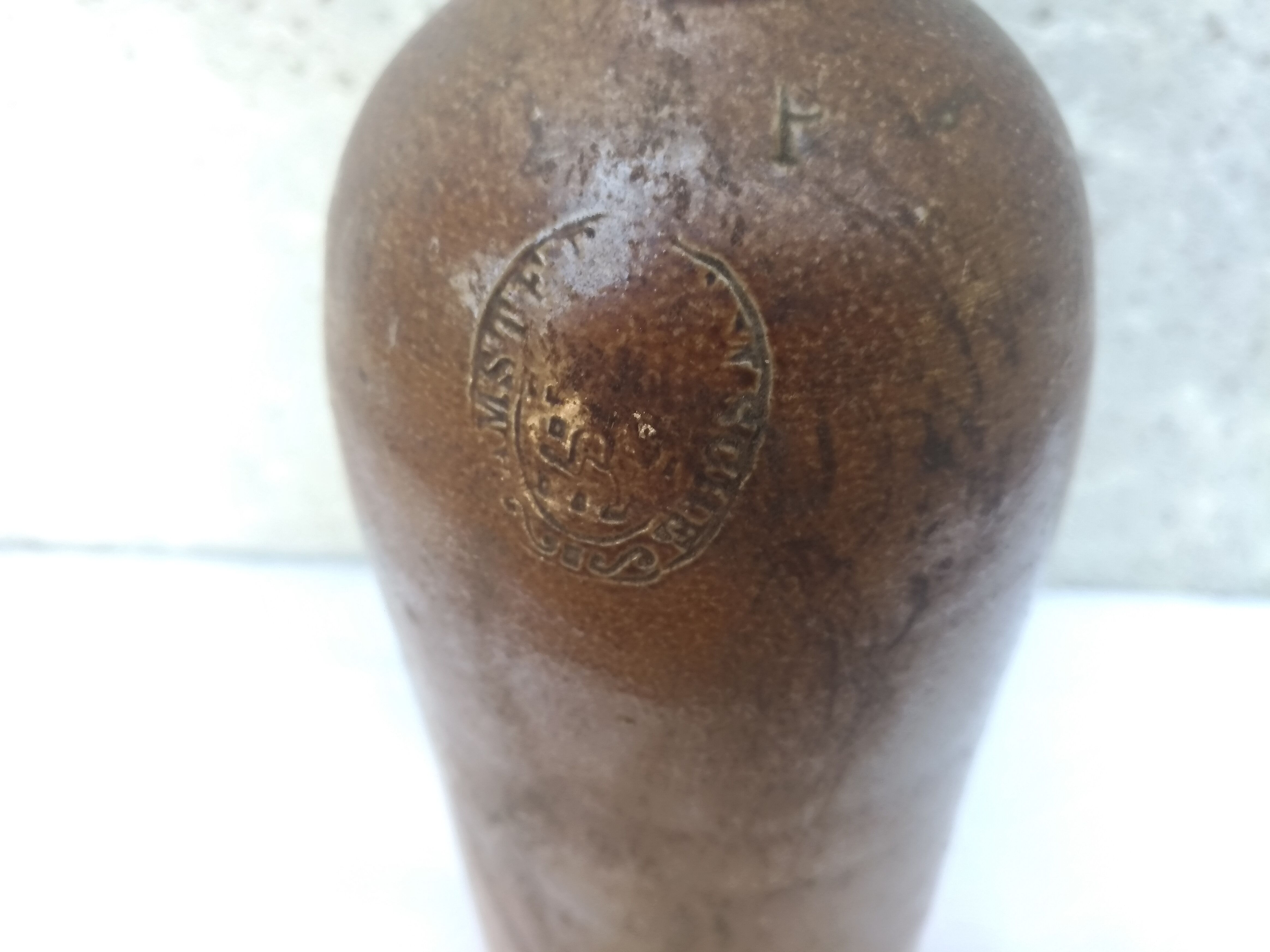 Bottle in sandstone