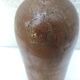 Bottle in sandstone