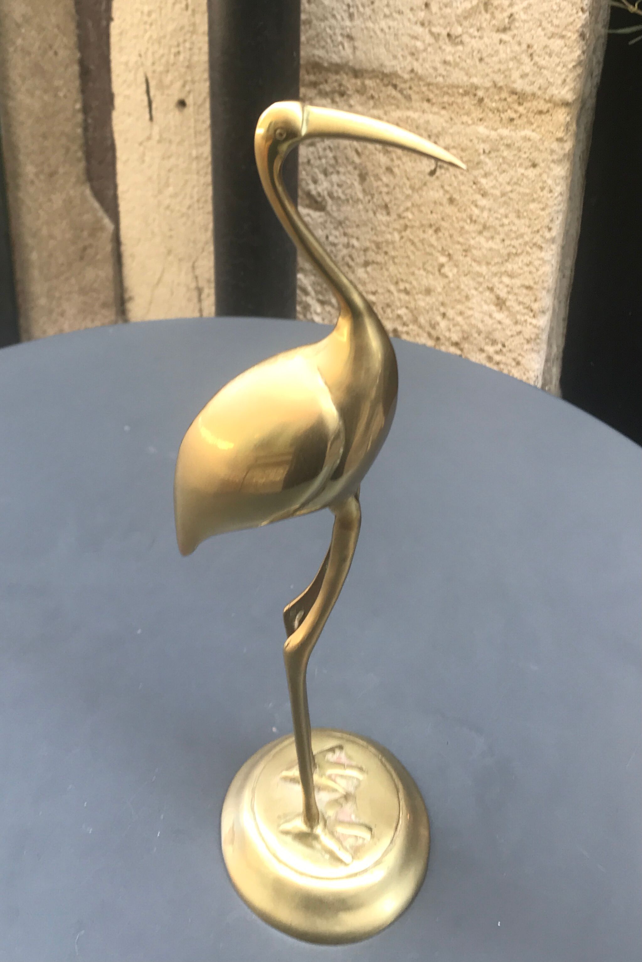 Large brass stilt walker