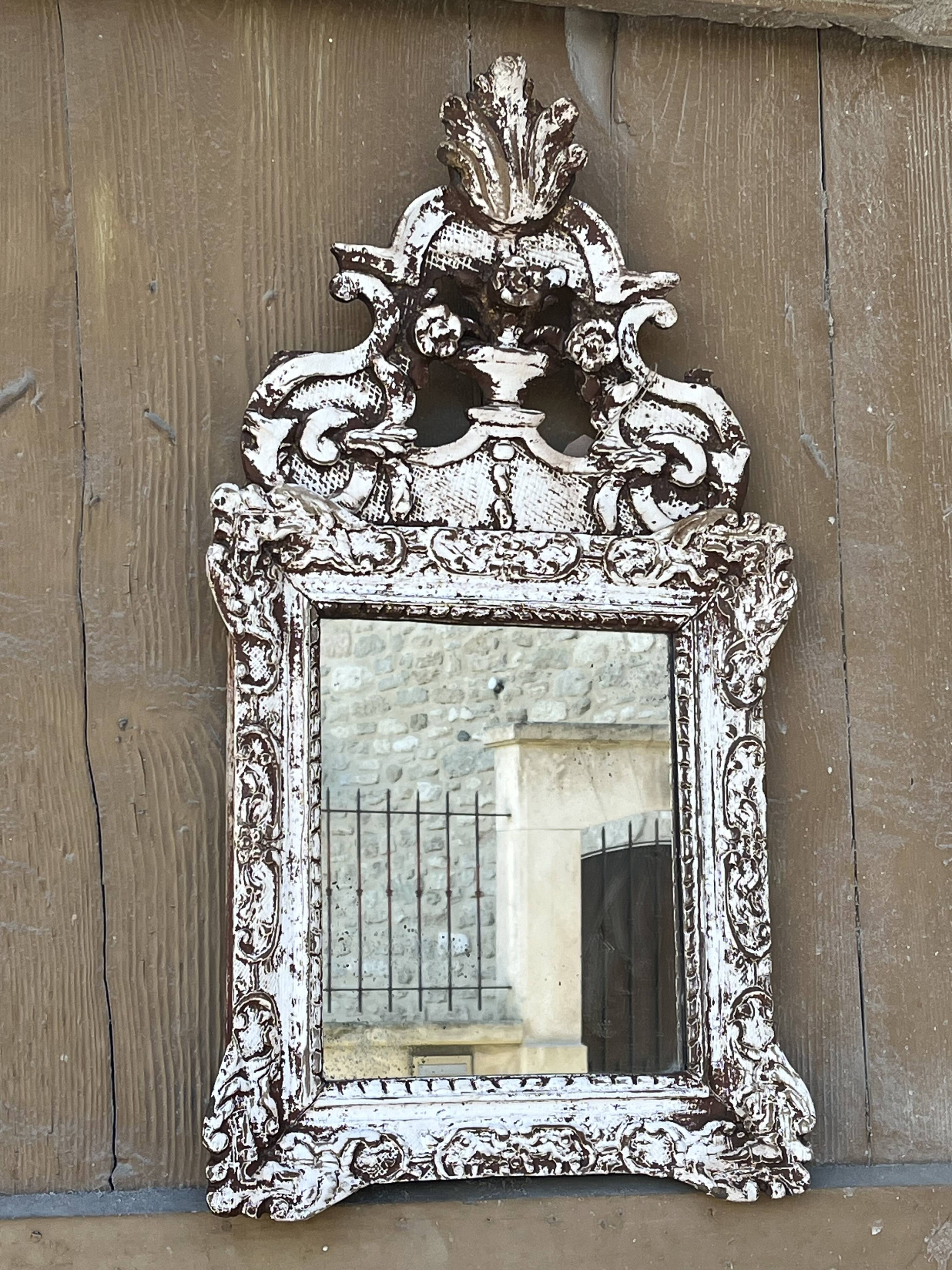 Carved wooden mirror