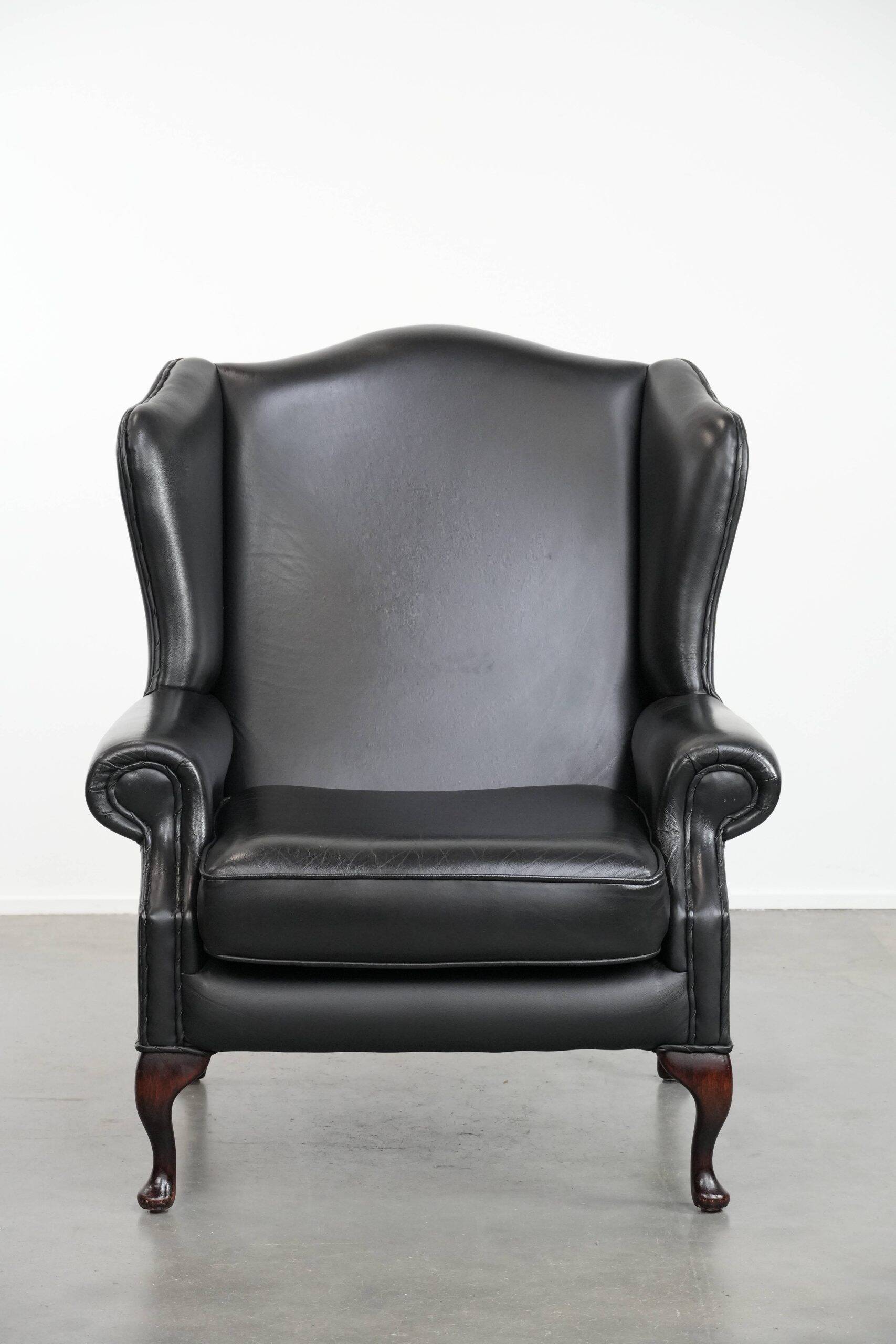 Black cowhide leather Chesterfield wingback chair in English style