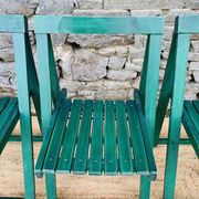 Set of 4 green folding chairs