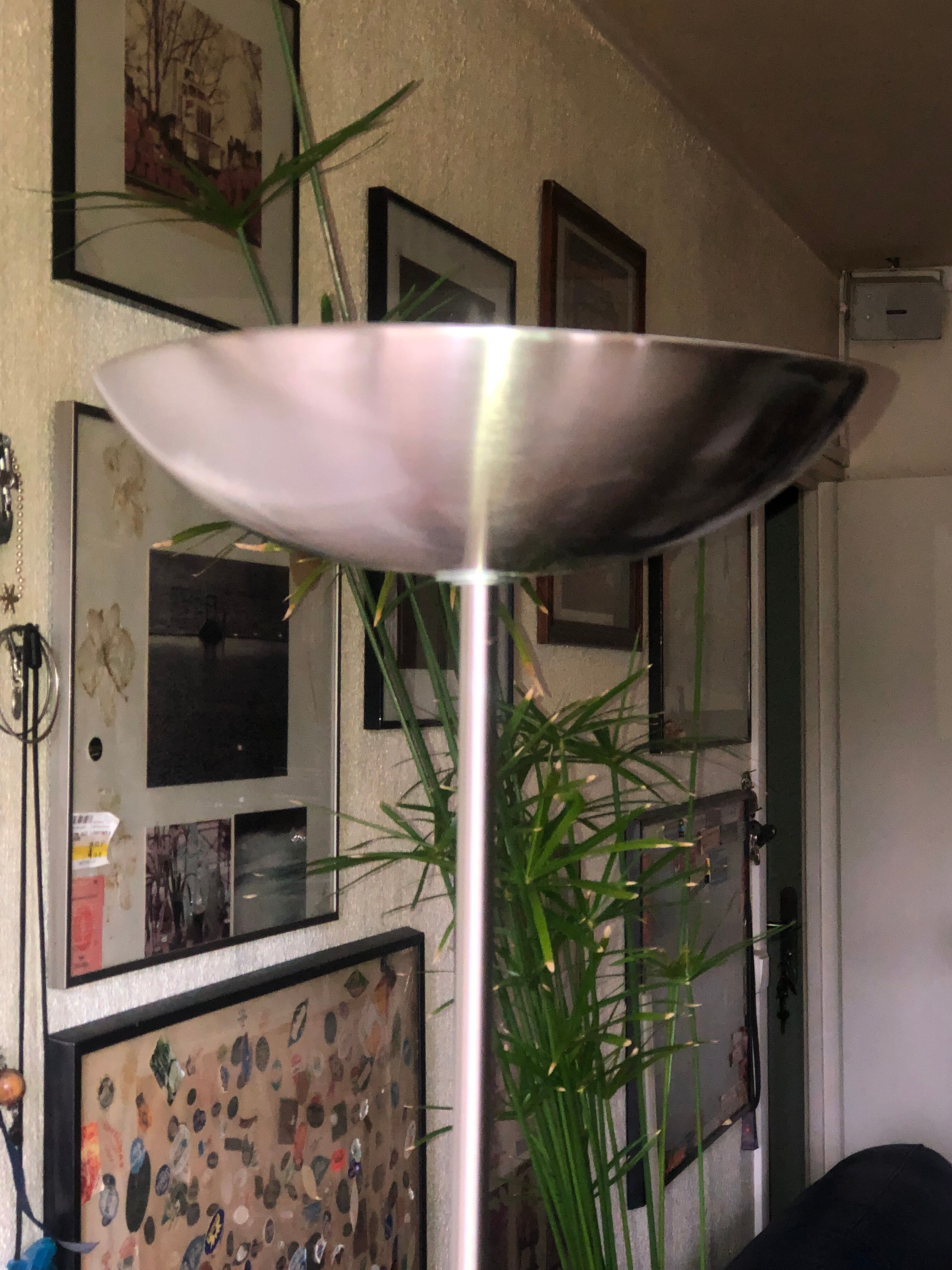 Discreet brushed metal floor lamp
