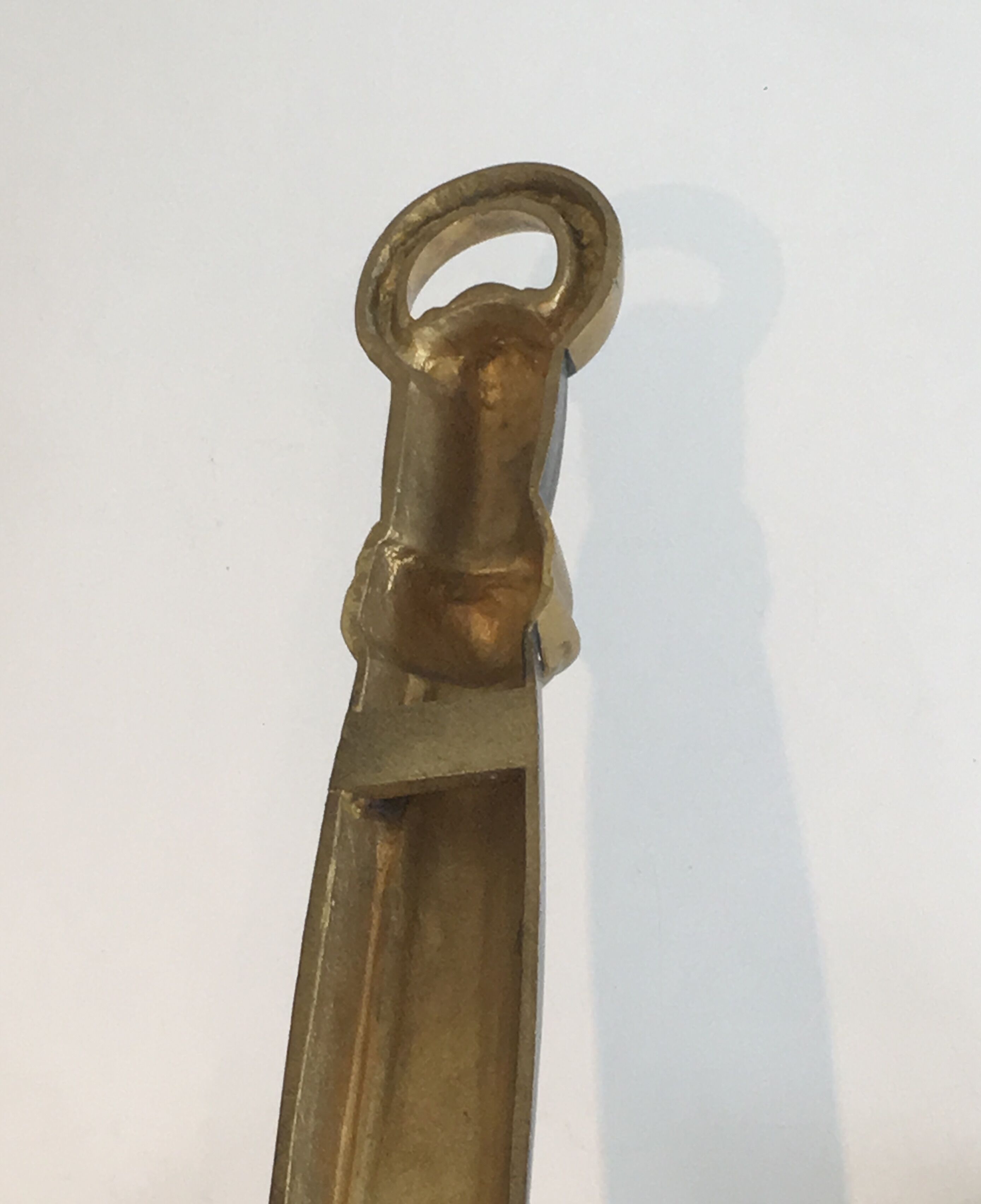 Pair of Black Lacquered Bronze Wall Lamps with Lions' Head Decorations. Around 1970