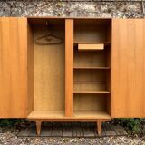 Rattan wardrobe and its compass-legged chest of drawers, 1960