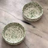 2 green speckled ramekins.