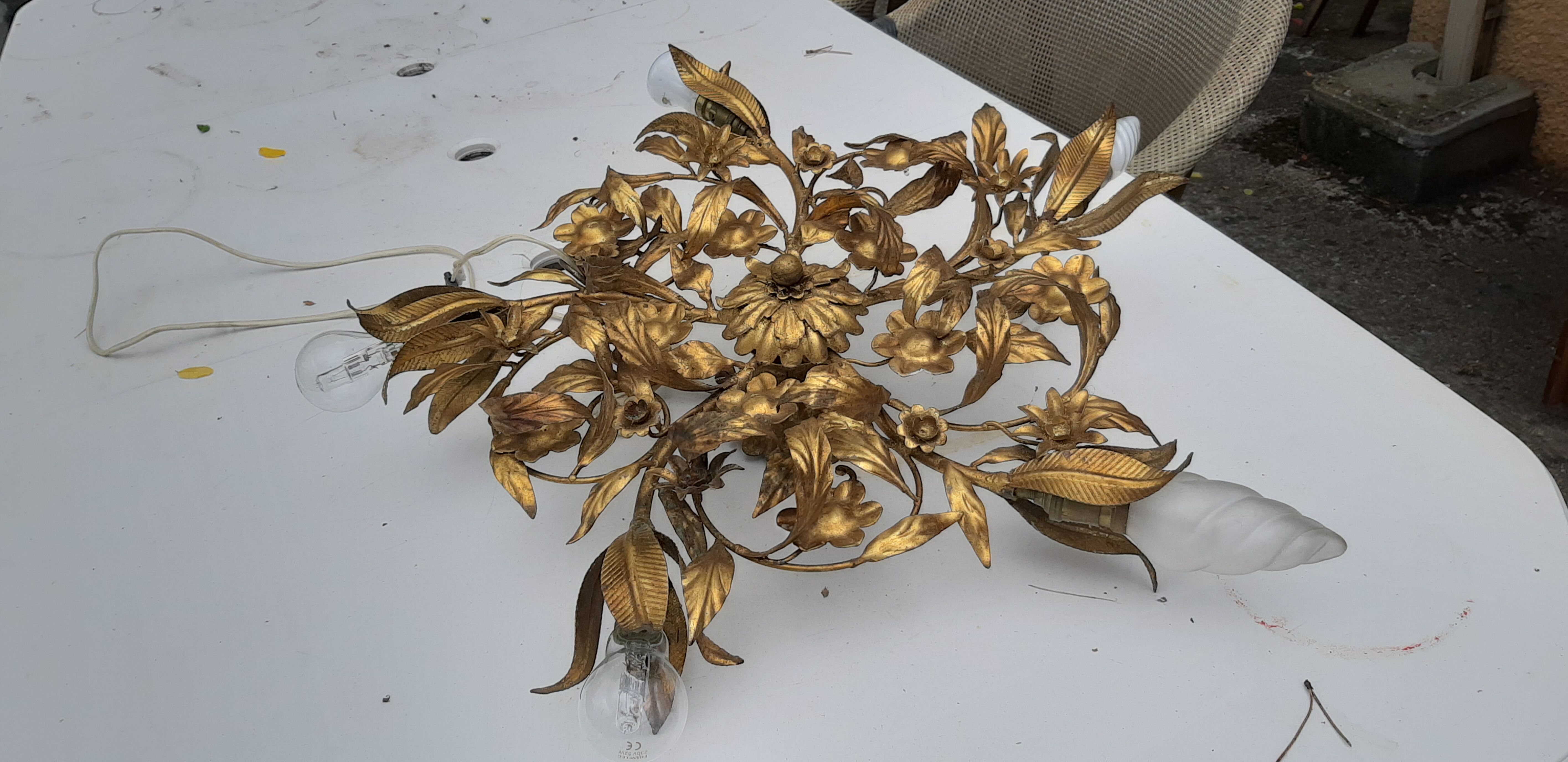 Vintage chandelier in gilded metal