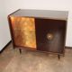 A vintage cabinet with a record player and a bar, 1960s.