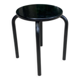Black curved wooden stool