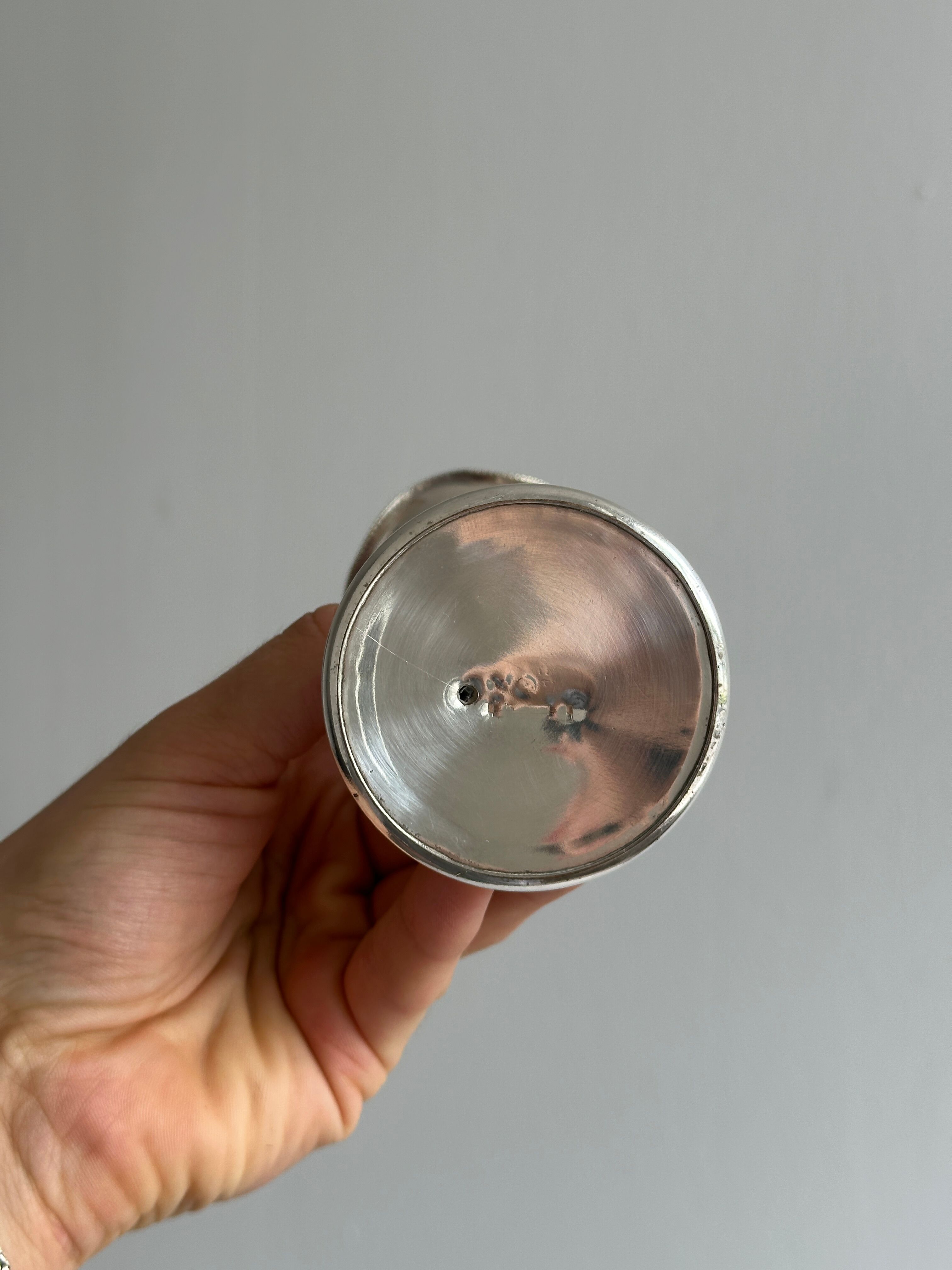 small antique silver-plated metal vase