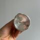 small antique silver-plated metal vase