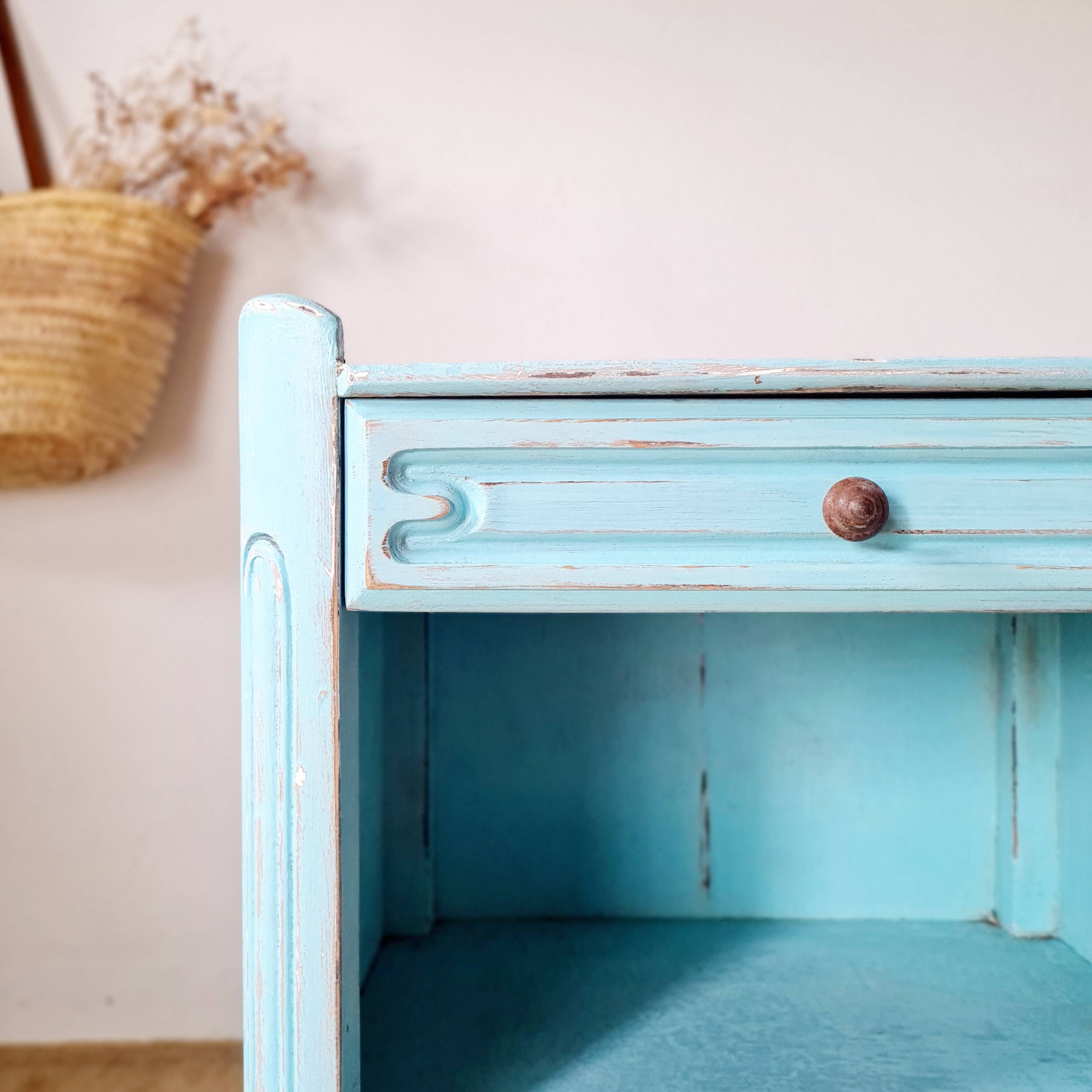 Small vintage bedside table in azure blue patina.