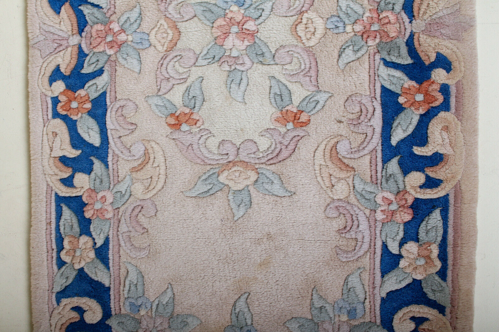 Chinese fringe rug with floral pattern on blue and beige background 63x143cm