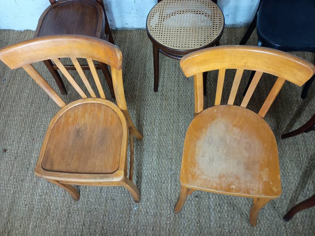 Set of 8 mismatched vintage bistro chairs