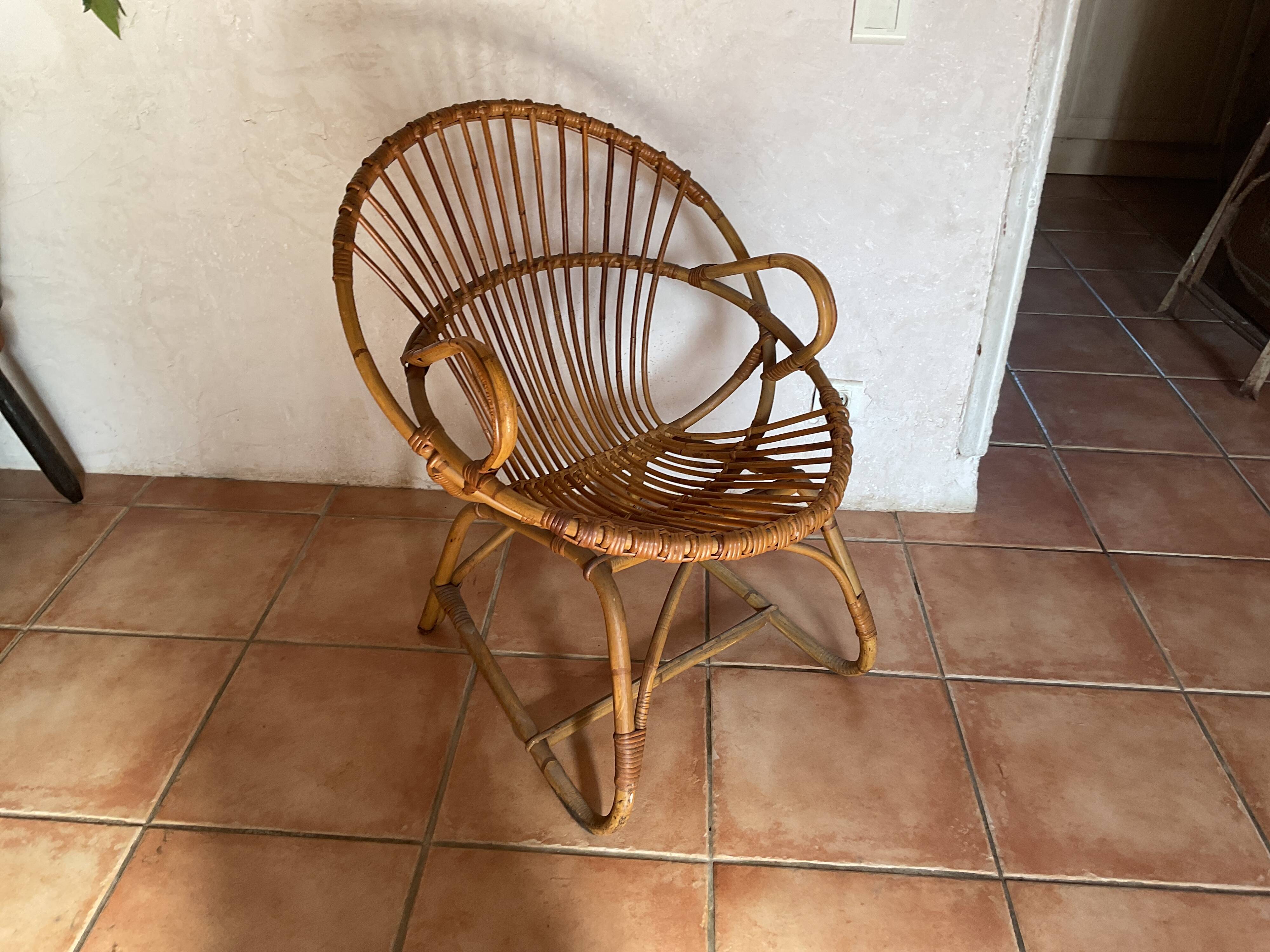 Rattan armchair with vintage design armrests